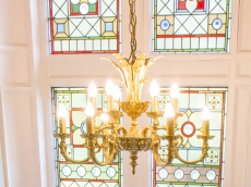 Access to the Honeymoon suite is via a grand staircase with stunning stained glass window 